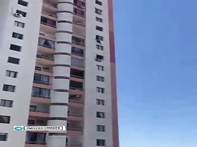 The woman was thrown from the building by her partner
