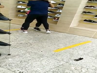 Fight of women in shoe store