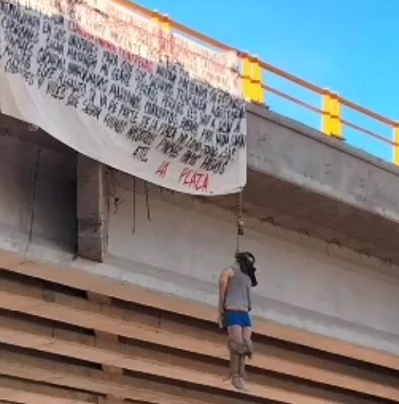 Cartel Monsters Hang Bodies from Bridge In Mexico