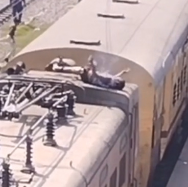 Dude Electrocuted On Top of Train Traveling 