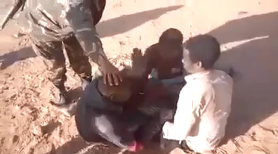 Algerian army humiliating and torturing illegal immigrant kids in southern Algerian desert
