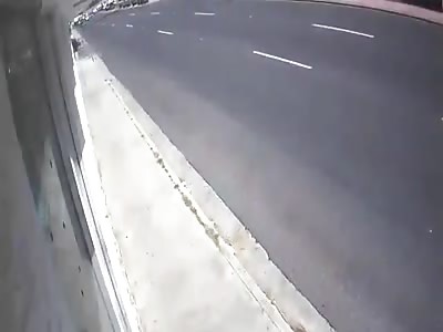 Motorcyclist rear ends a car & goes flying.