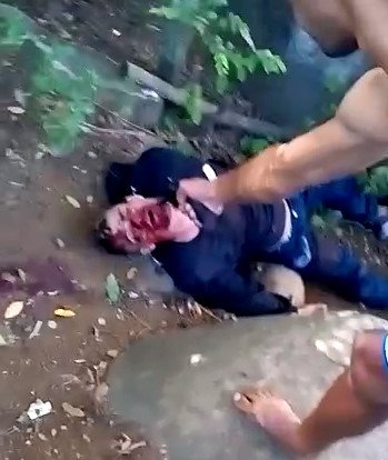 Already Wounded Man is Executed by Pistol with Two Shots in the Face