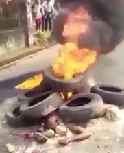 Thief is Set on Fire , Beaten and Stoned 