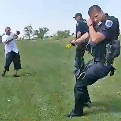 Cops Shoot Fleeing Suspect After He Draws a Gun And Fires at Them