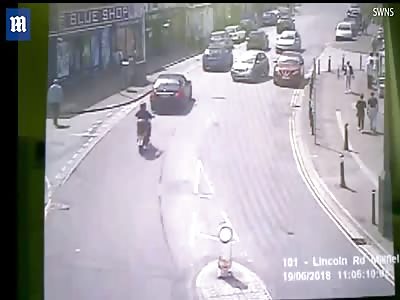 Shocking moment drink driver narrowly misses father and baby son