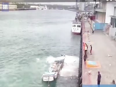 Port worker escapes after shocking harbour crane accident