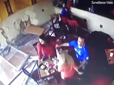 Shocking video shows woman slamming car into restaurant