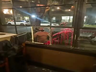 Drugged Portland Moron Paints Window In Red