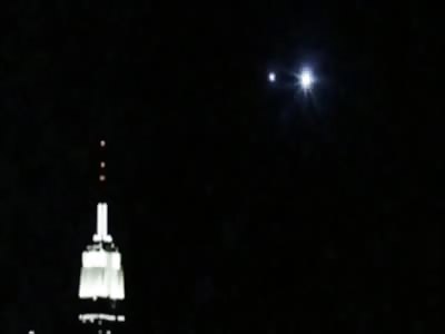 UFO exits The Moon or Mothership in Manhattan