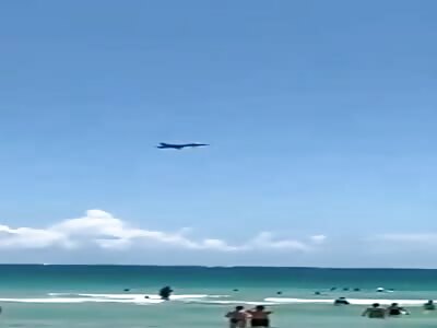 UFO Flies Up from the Ocean Near a Plane