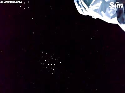 Cluster of UFO's pass by Space Station
