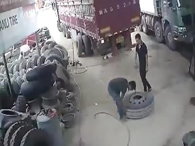 Tire Explodes When the Worker Lifts it Up!