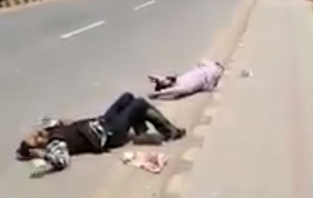 Bank Robbers Lay in Agony After Being Shot