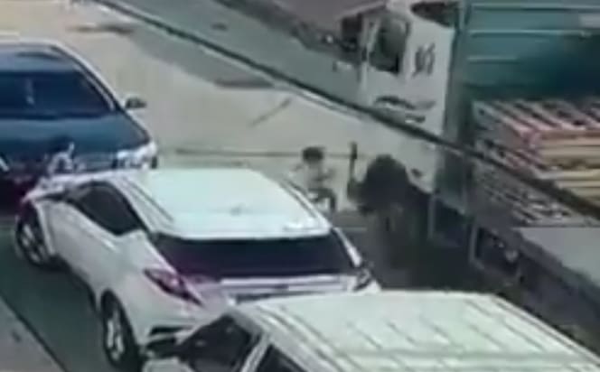Kid Gets Flattened by Tractor Trailer