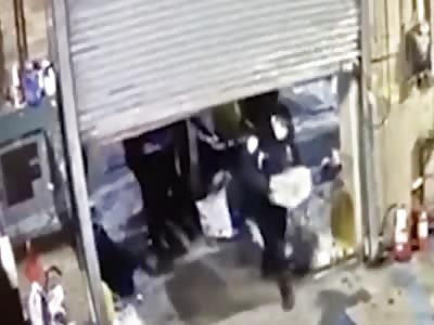 NYPD Officers Legs Crushed by Garage Door