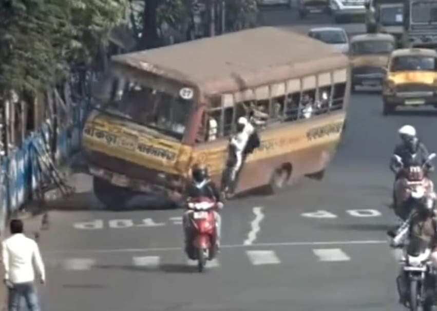 Genius Hitches Ride On The Outside Of A Bus