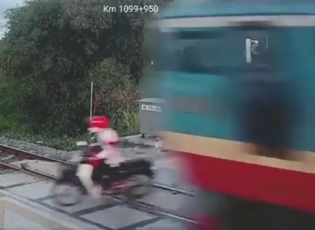 Biker Obliterated At Train Crossing