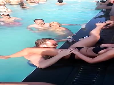 Pussy licking session at the resort pool