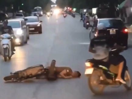 Biker Knocked Down By Car Convulses In The Road