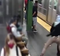 Woman Pushes Another Into An Arrive Subway Train