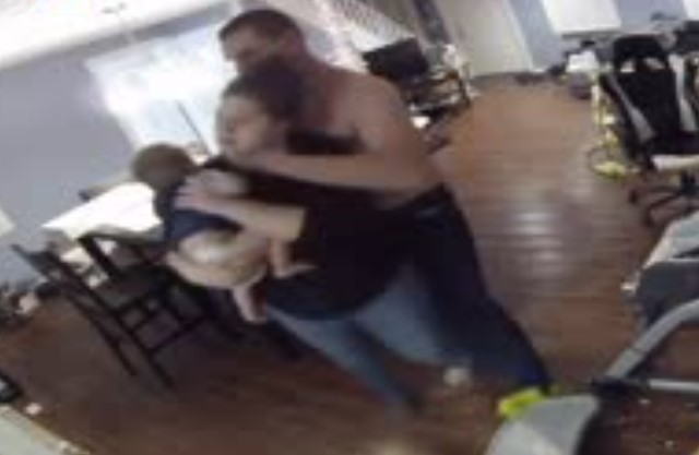 Dude Chokes The Breathe out of his Wife While Holding Their Baby.
