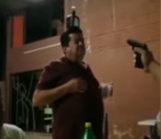 Moronic Drunk Guy Lets Another Guy Shoot a Bottle off his Head