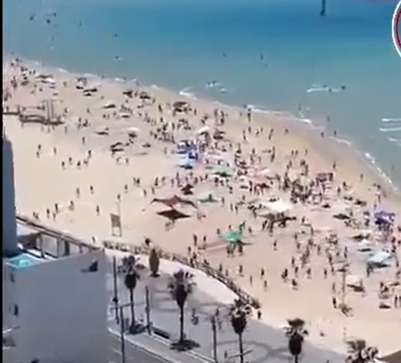 DAMN: Bombing of an Israeli Beach Sends People Scattering