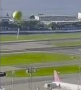 Firework Balloon Lands on Airplane