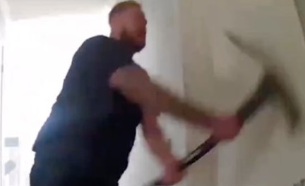 THE SHINNING: Man Breaks Down His Terrified Roommate's Door With a Pickaxe