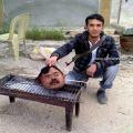 Man Cooks the Head of His Enemy after Beheading