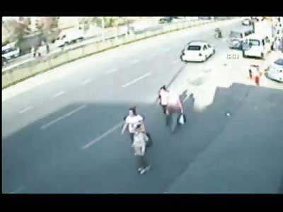 Young Girl in Pink Shirt is Backed Over by Clueless Driver