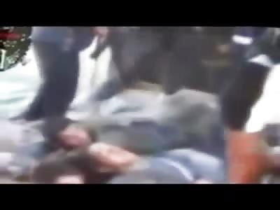 Cell Phone Footage shows 20 Men Crying Piled up all Executed in Building (Bad Quality)
