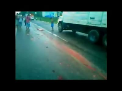 Female Ripped in Half and Smeared on the Pavement in Brazil