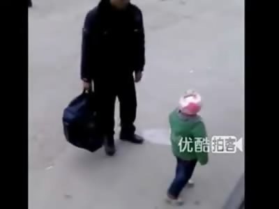 WTMF: Father and Toddler Son Share a Smoke While Waiting for the Bus
