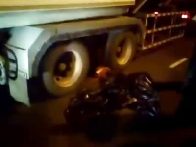 Man Killed Under Wheel of Truck ........ Splattered