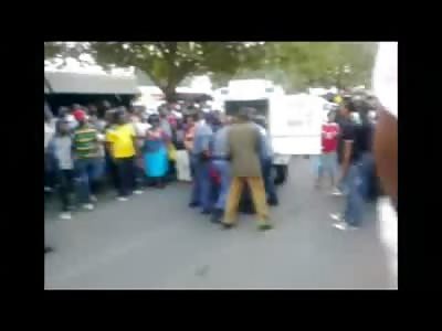 SHOCK VIDEO: : South African Taxi Driver dies after being Handcuffed to Police Vehicle and Dragged...
