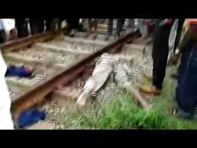 Man Exploded all Over Train Tracks as Curious Cameraman gets a Close Up