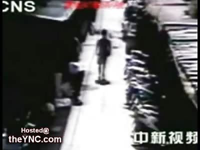 Street Cam in China captures a Suicide Jumper that lands on Someone