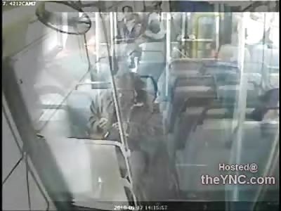 Asshole gets on Bus..Talks Shit to Mentally Disabled Man and then Sucker Punches KO's Him off the Bus (Watch Slow Motion)