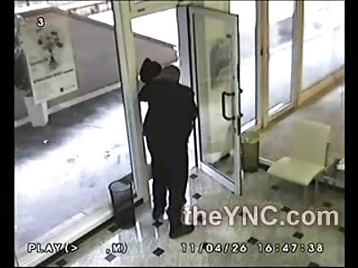 Security Guard with a Lot of Guts Fights off Robber with a Gun Pointed at his Face
