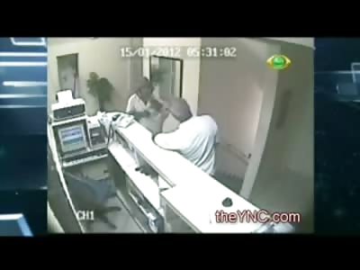 Security Guard with Big Gun Executes Robber at Front Desk