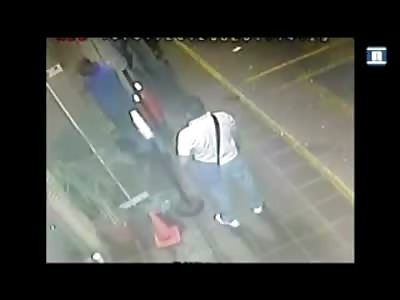 Security Guard accidentally Executes Man Armed Man outside of Bar (White Shirt watch his Left Hand)