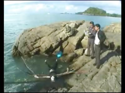 Bloated Smelly White Floating Corpse is pulled out of the Dirty Water