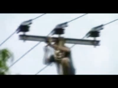 Man Playing on Power Lines is Zapped to Death and Dangles in front of Onlookers