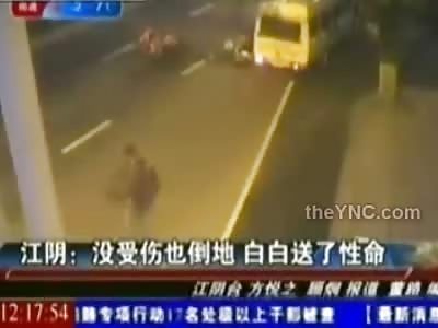 WTMF: Woman Refuses to Leave Accident Scene sits Down in Road.....Ends up Getting Run over by a Bus