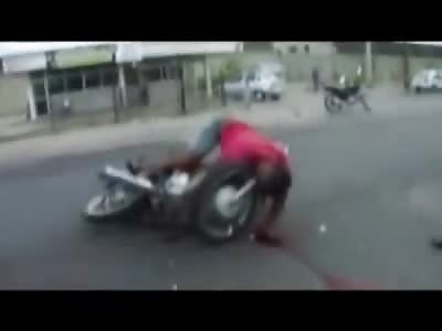 Dead Biker ends in Awkward Position Ass Up to the Whole Crowd watching Him