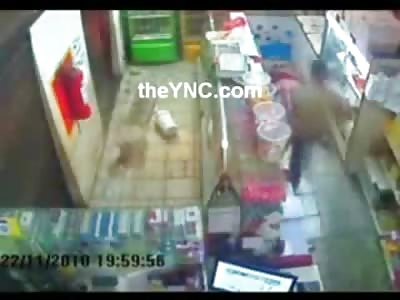 Store Owner Husband Bum Rushes Robber and is Shot Dead Instantly (Watch Slow Motion)