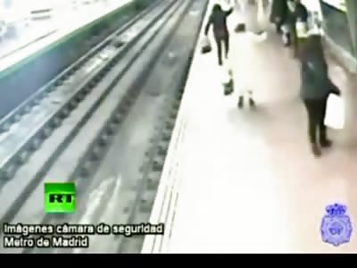 Man Who Fell on Train Tracks is Rescued Seconds Before Death