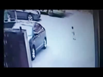 Shock Video: Toddler Child is Run Over by a Bus and his Head Pops under the Tire